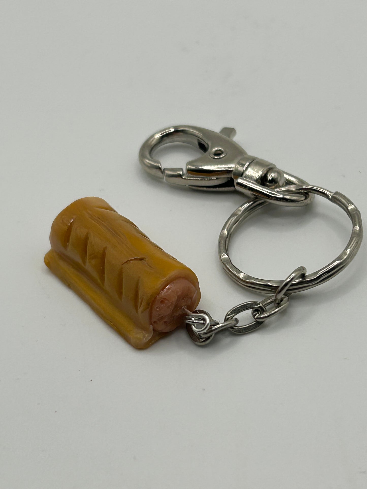Sausage roll key charm