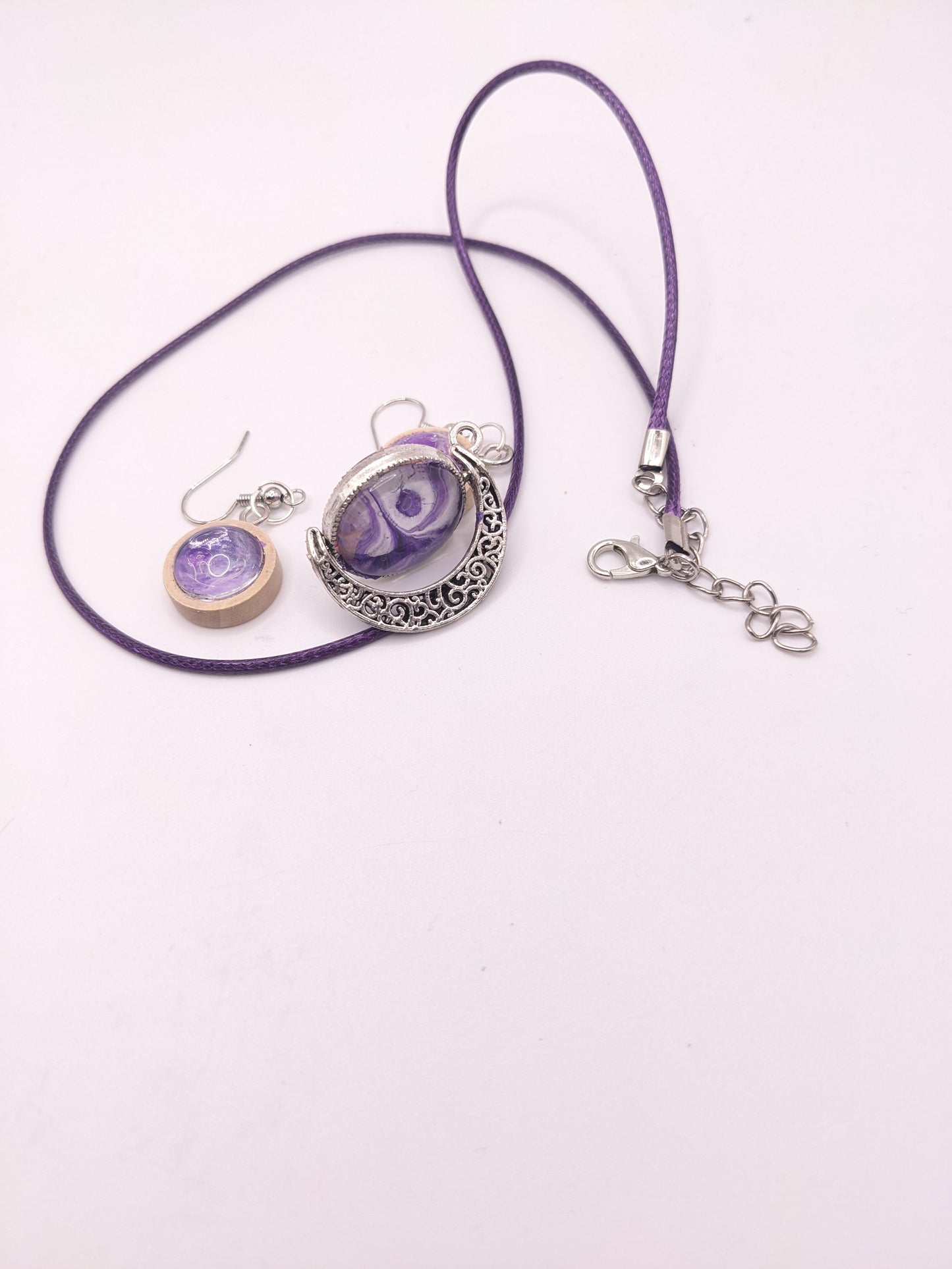 Earring and fidget spinner pendant